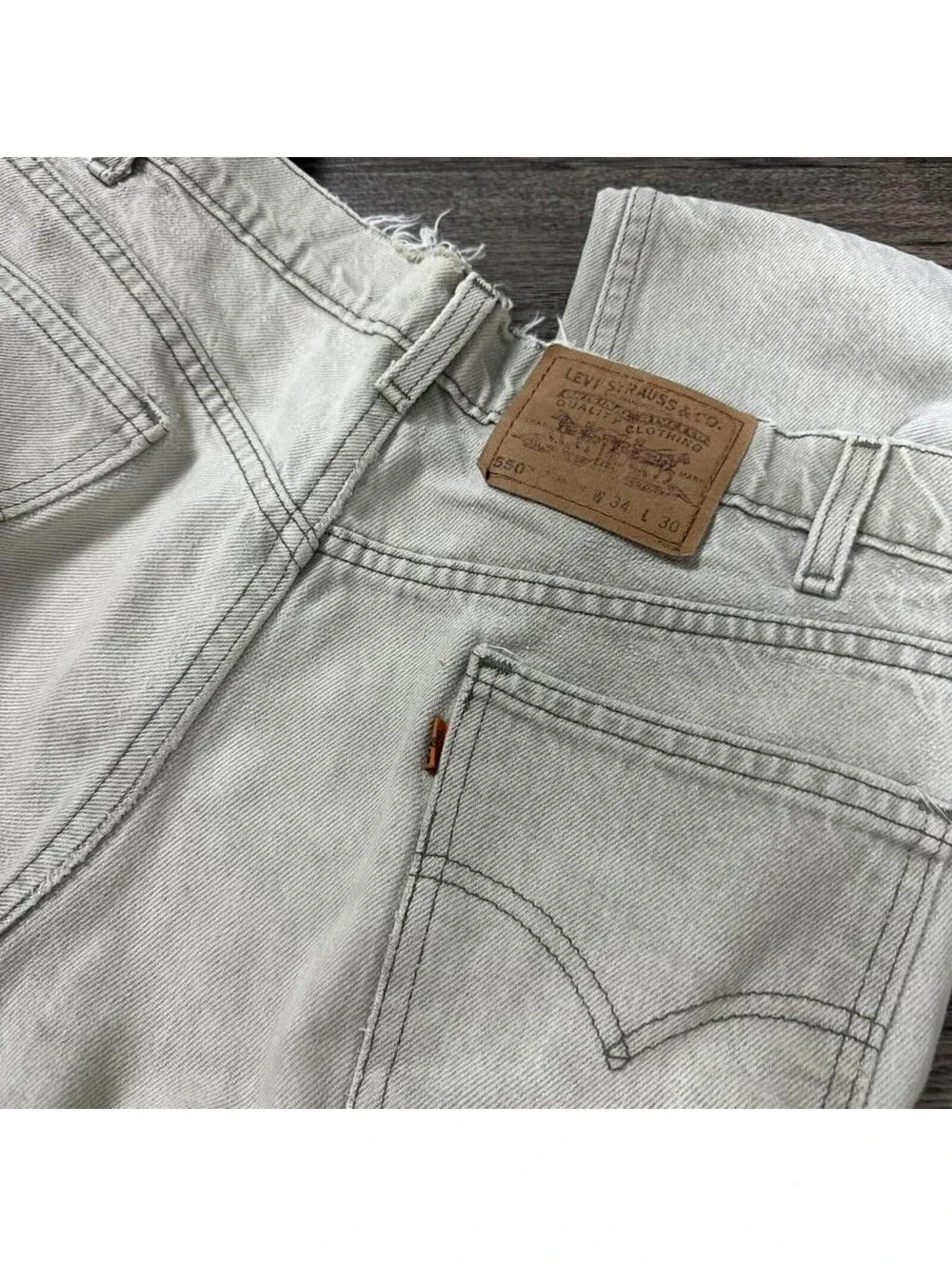 Vintages distressed Levi’s orange tab 550 straight fit light cream jeans 34x30